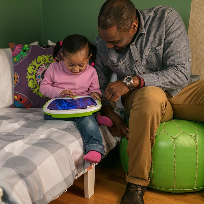 Father and child being creative together.